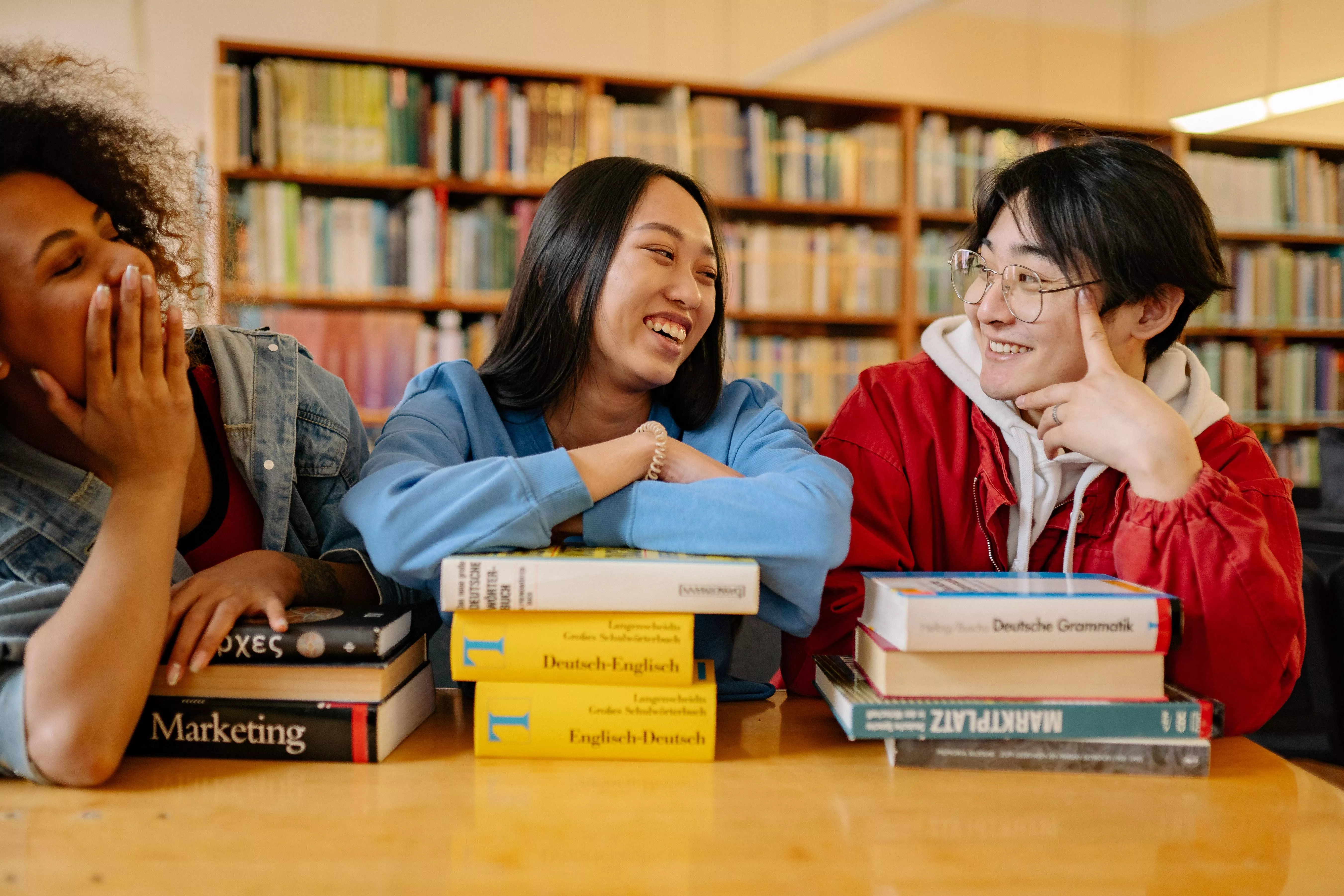 People enjoying a room at the library.